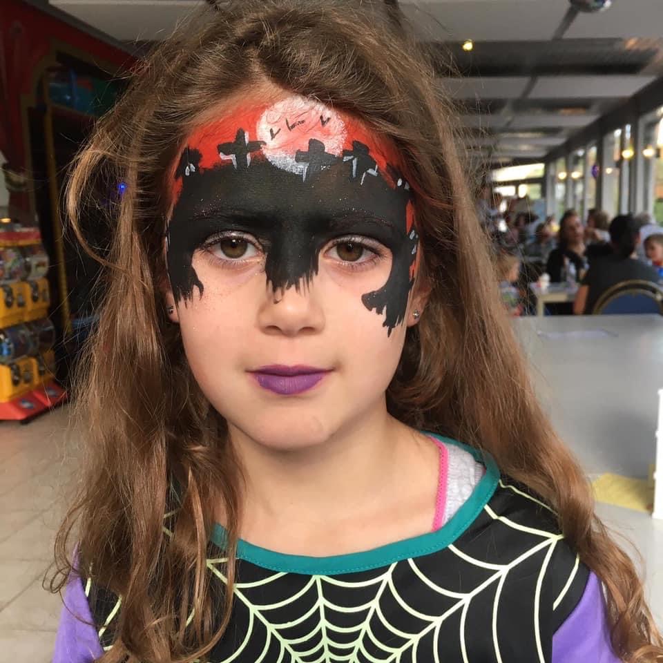 Kind met Halloween schmink